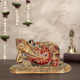 Brass lying Ganesha statue, red jeweled enamel with gold base, 4 inch height