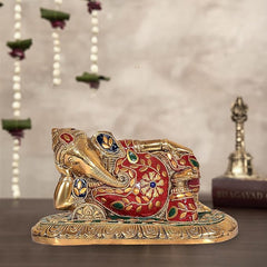 Brass lying Ganesha statue, red jeweled enamel with gold base, 4 inch height