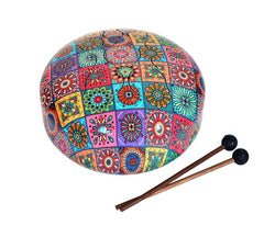 Happy steel drum with patchwork pattern and two wooden mallets with black heads