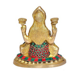 Maa Lakshmi brass idol back view, turquoise and red beadwork belt, seated