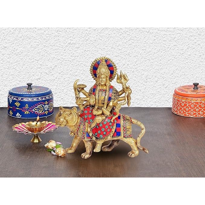 Dattatreya brass Durga statue seated on decorated lion, multicolor ornaments