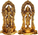 Brass Maa Lakshmi & Lord Vishnu idol, 9.5 in; seated figures with ornate arch.