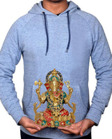 A person holding brass Ganpati Murti printed on a light gray hoodie front