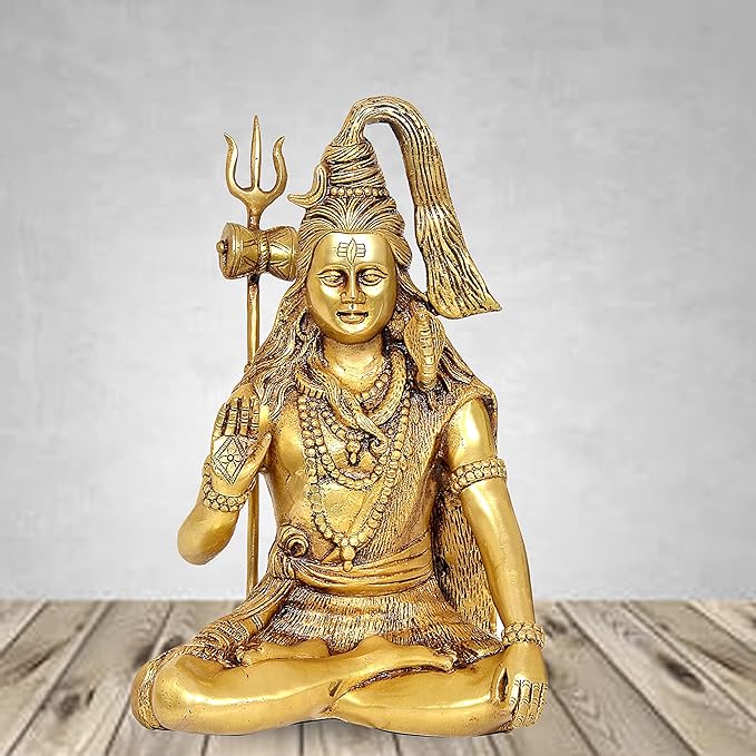 Brass Shiva statue in blessing pose, trident raised in left hand