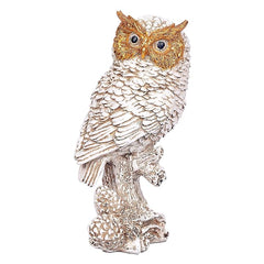 Standing owl statue with detailed feather pattern and blue eyes, cream with brown