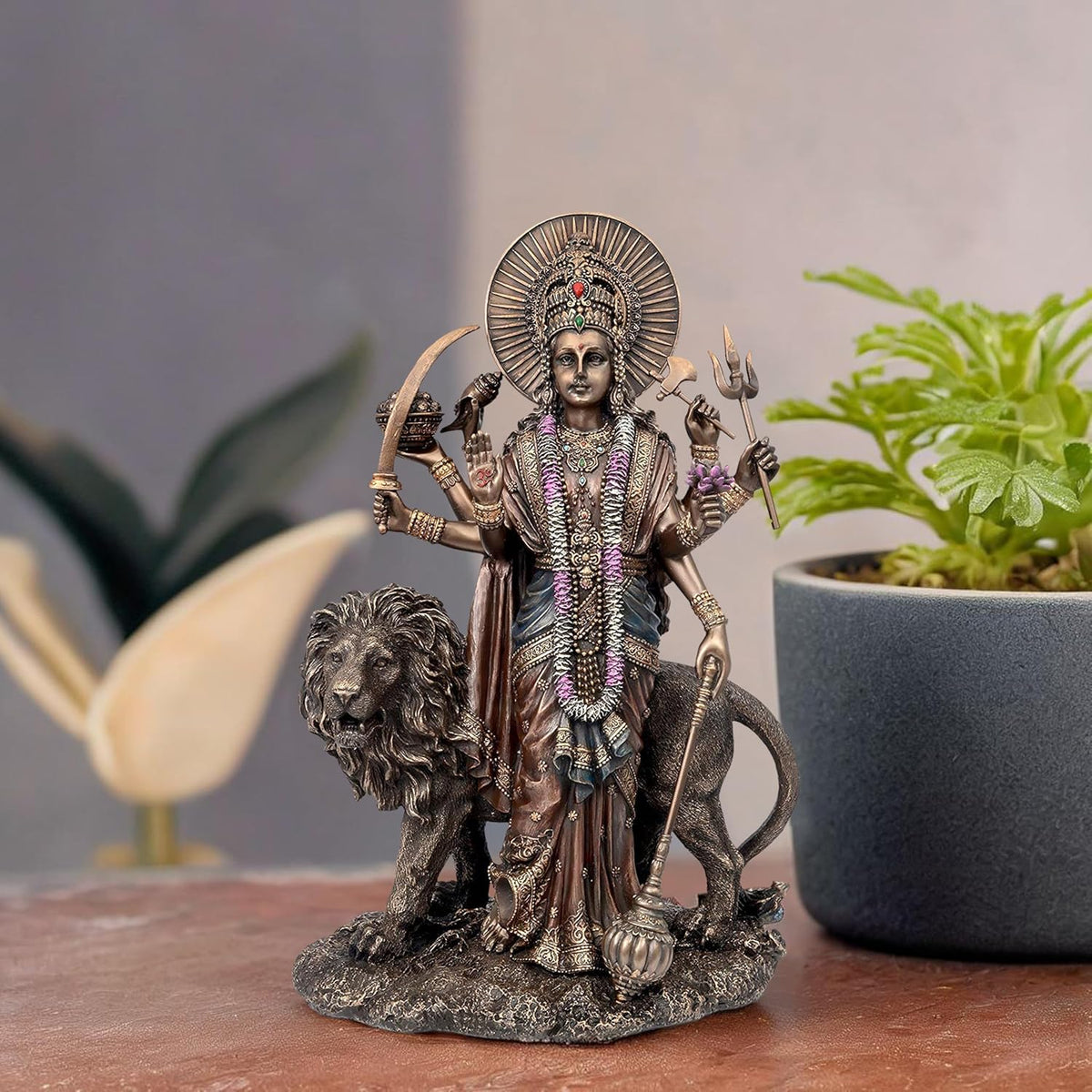 Resin Durga with lion idol, multicolored details, raised halo, 11 in