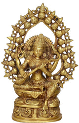 Brass Saraswati figurine with detailed face and carved halo ring, seated with veena