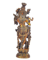 Brass Krishna idol back view with circular halo detail on ornate pedestal