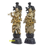 Brass Radha Krishna deity figurines, side view on carved dark base