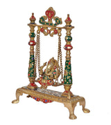 Brass Ganesha swing idol on base with hanging chains, four painted columns