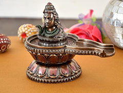 Resin Shiva Shivlingam Idol, side view of bronze linga holder with arched spout