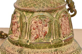 Close-up of brass Ram Darbar panel on hanging bell, ornate border and gold details
