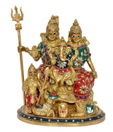 Shiv Parivar family idol: central seated deity with trident, two standing figures