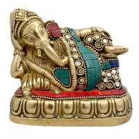 Brass resting Ganesha idol with jeweled blue and red accents, 4 in height