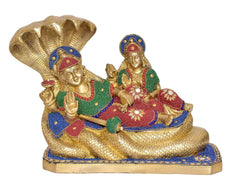 Lakshmi and Vishnu brass idol on coiled Sheshnag, blue-red-green jewel accents