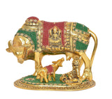 Gold cow idol with calf and Bal Krishna, seated figures and multicolor jeweled panels