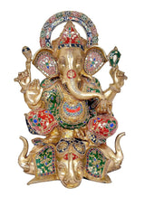 Brass Ganpati statue with crown halo, red and green jeweled patterns, trunk facing front