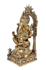 Gold brass Ganesha statue, side view with raised hand and detailed jewelry