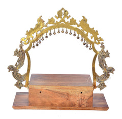 Brass arched mandir frame with bells, wooden base and side view of drawer