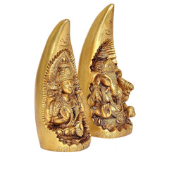 Brass Lakshmi and Ganesh cone idols, om symbols on top, sculpted figure details