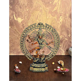 Brass Nataraja Shiva showpiece, dancing figure in detailed circular halo base