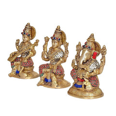 Brass Saraswati, Lakshmi & Ganesha idol statues, side views with red and blue detailing