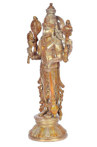 Golden brass Vishnu ji standing idol, angled view with tall crown and detailed back