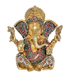 Brass Lord Ganesha idol statue with jeweled ear ornaments and red-blue gemstone details