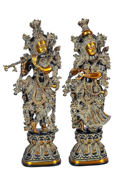 Brass Radha Krishna idol pair in black finish, detailed armor-style outfits and crowns