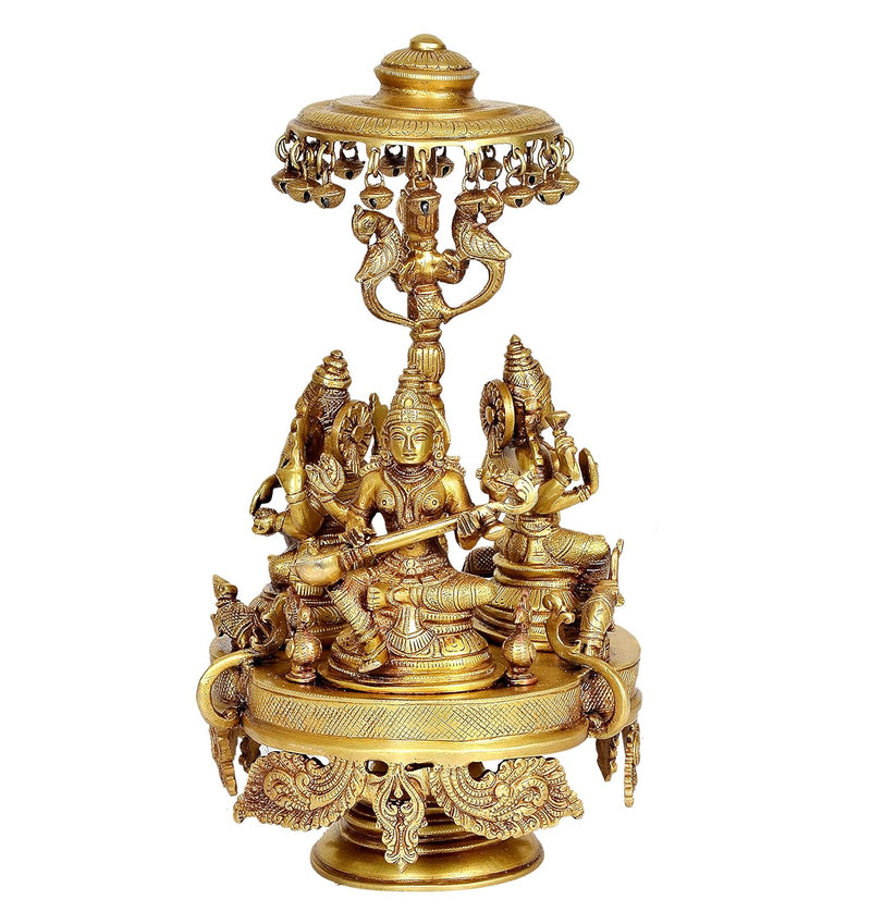 Brass Lakshmi, Ganesha and Saraswati Seated on Rotating Chowki with Parasol Idol (Height: 14 Inch)
