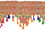 Patterned toran bandhanwaarh top border with circular designs and dangling tassels