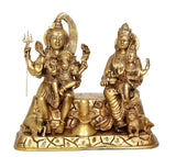 Brass Shiv Parivar idol front: seated Shiva with trident and Parvati with raised hand
