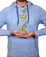 Brass elephant & peacock oil lamp diya held in hands, front view