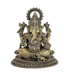 Brass Ganesha idol, seated with multiple arms and haloed crown, detailed base