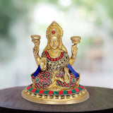 Maa Lakshmi brass idol with multicolor beaded jewelry, four hands, seated pose