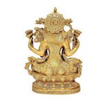 Back view of Lord Lakshmi brass idol, carved details on crown and draped body