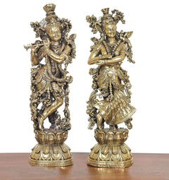 Brass Radha Krishna idol pair, front view with sculpted crowns and detailed garments