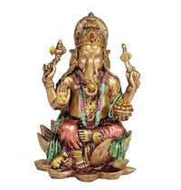 Ganesha statue in resin, gold face with colorful ornaments, seated on lotus