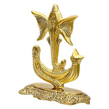 Gold metal Ganesha idol with butterfly-shaped ears, ornate pedestal base