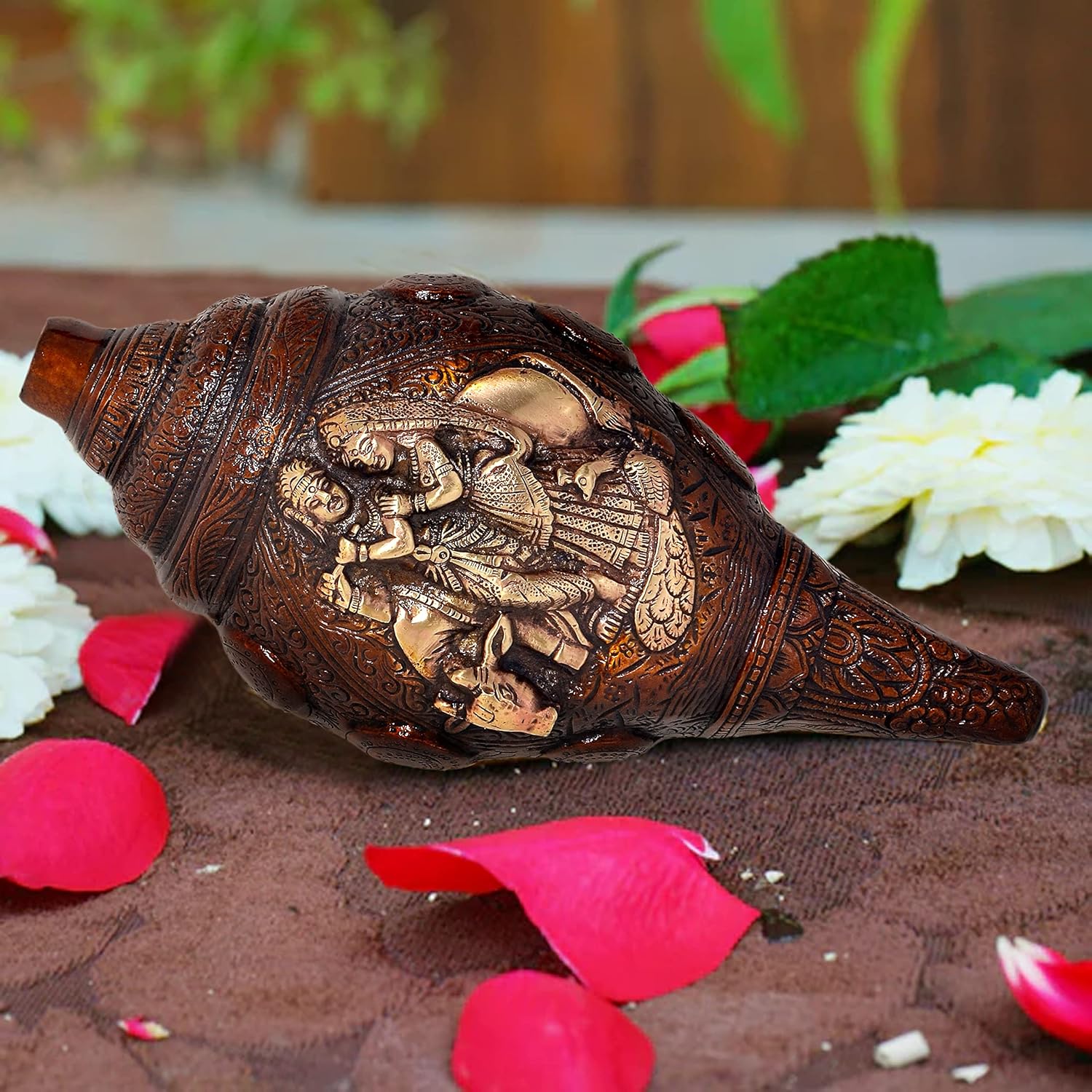 Brass shankh with Radha-Krishna relief print and ornate carved detailing for puja