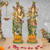 Radha-Krishna resin idol set, two ornate standing deities with gold crowns and colorful robes