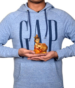 Resin Laddu Gopal idol in hands, 4 inch seated figure with butter pot and crown.