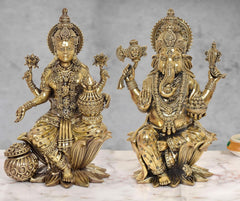 Brass-finish Lakshmi and Ganesh statue, seated with ornate crowns and raised hands