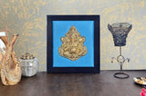 Brass Ganesha framed wall art with dark wooden square frame