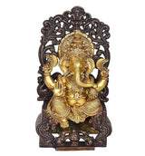 Lord Ganpati statue facing forward, gold detailing on dark decorative throne