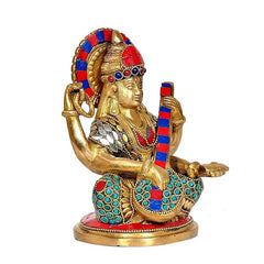 Brass Saraswati idol statue, seated side profile; fan-like headpiece and beaded ornaments