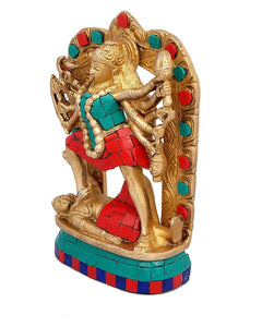 Brass Maa Kali statue, side view with turquoise and red mosaic base and halo