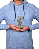 Brass Shreenathji Thakurji statue, 4 inch, held in hands on blue hoodie