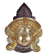 Brass Maa Durga idol face close-up with ornate crown and gold detailing
