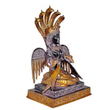 Brass Naag Kanya statue idol viewed at angle, seated figure with raised serpent hood